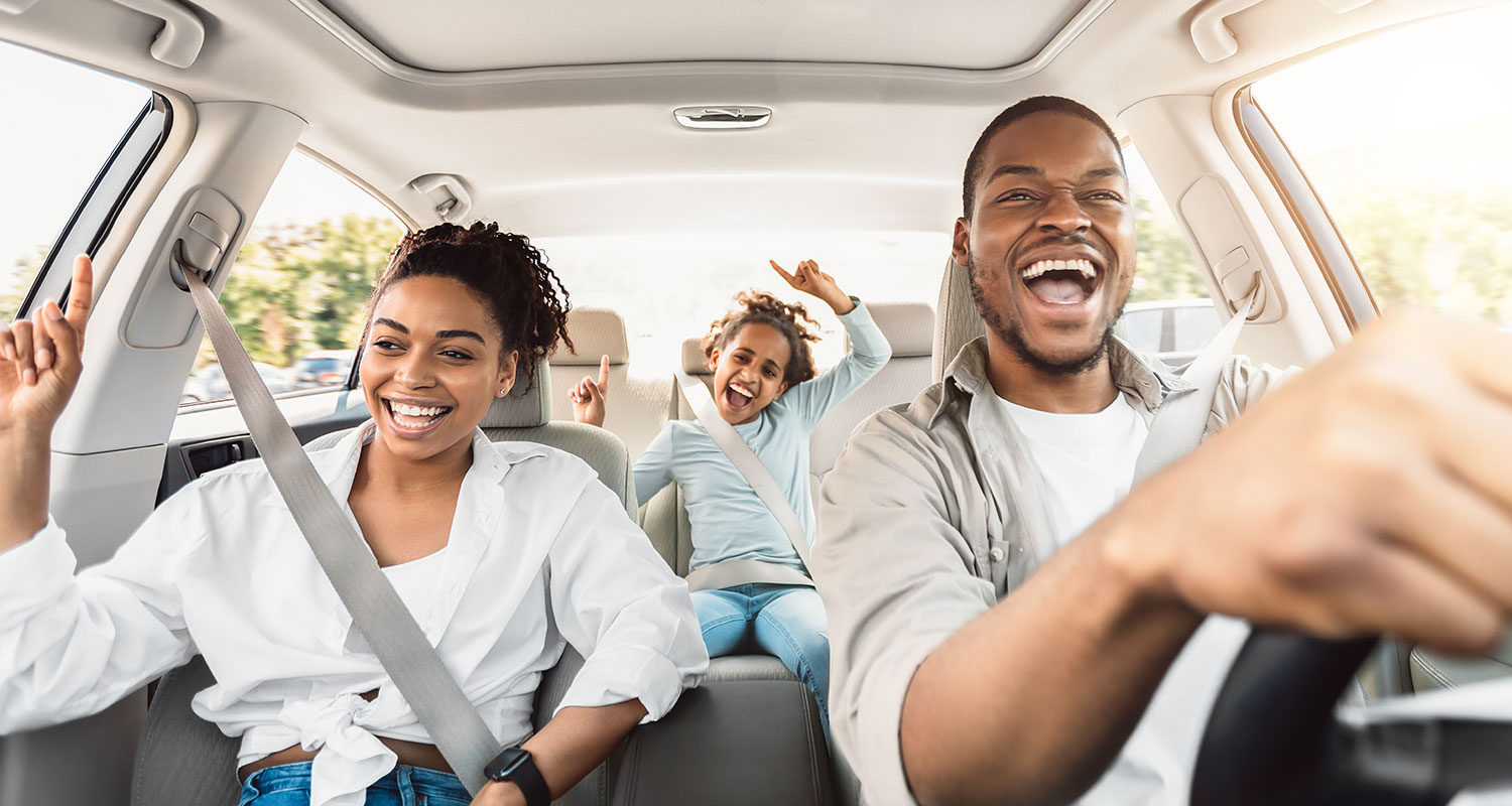 A family enjoys the vacation with a rental car